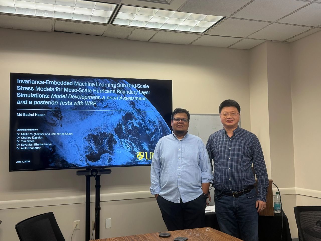 With advisor Dr. Meilin Yu after the defense