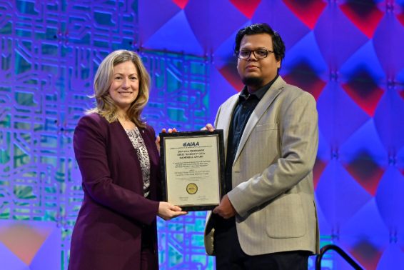 Receiving the 2025 AIAA award at SciTech